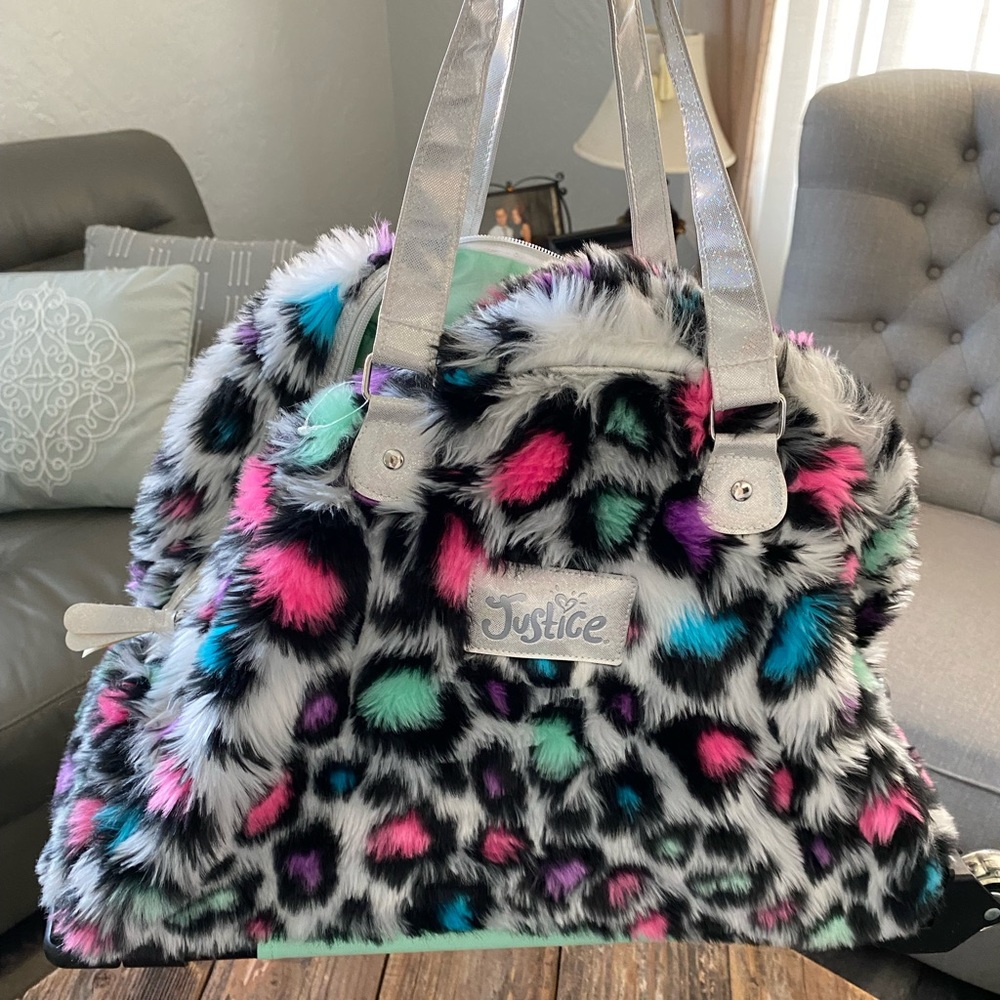 Justice travel roller handbag